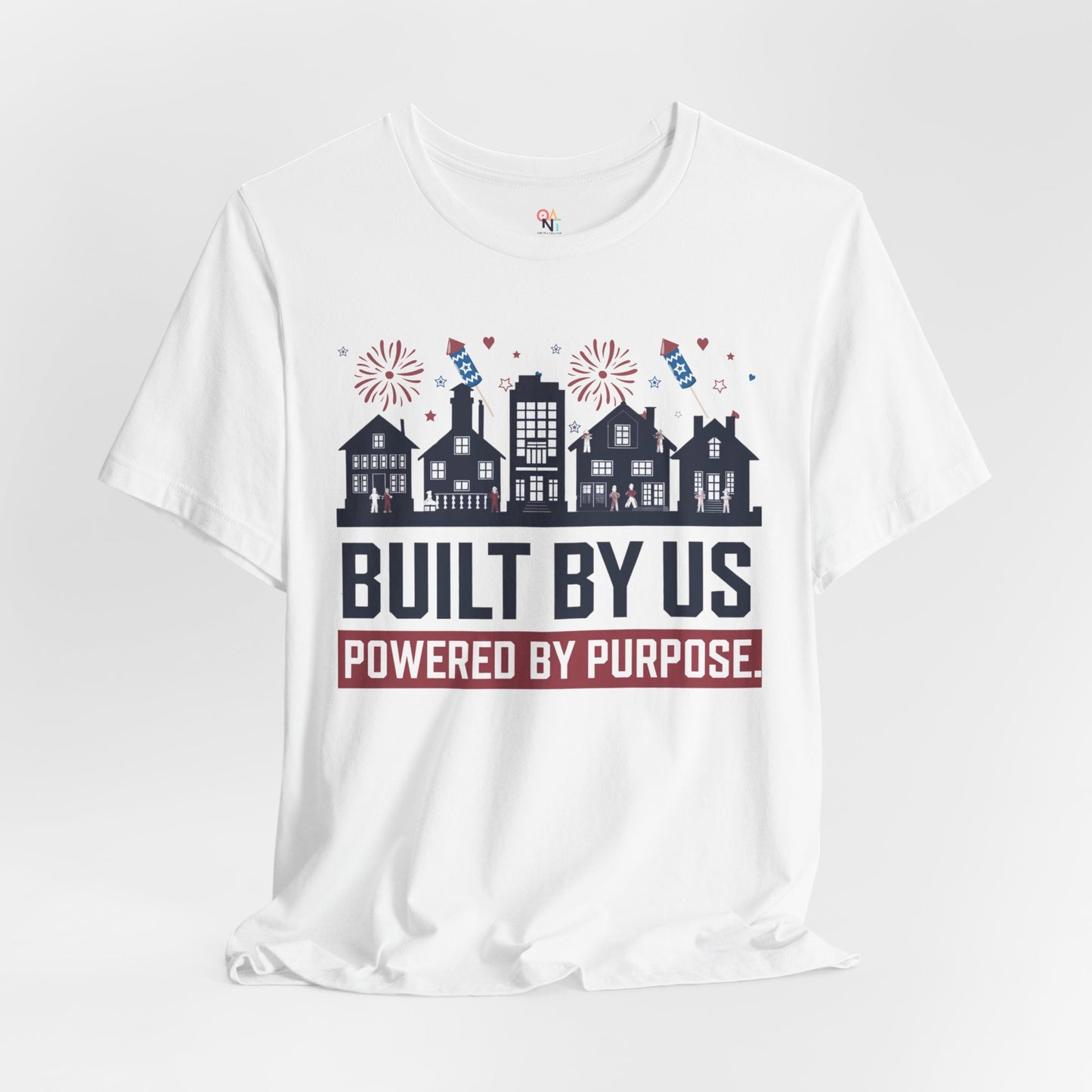 4th of July Unisex T-Shirt – "Built By Us. Powered By Purpose." Patriotic Skyline Design
